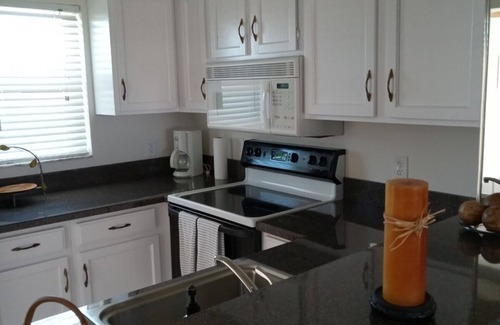 Old Naples Condo | Beau Mer Top Floor Condo with Panoramic Naples Bay Views