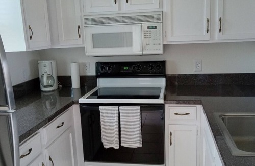 Old Naples Condo | Beau Mer Top Floor Condo with Panoramic Naples Bay Views