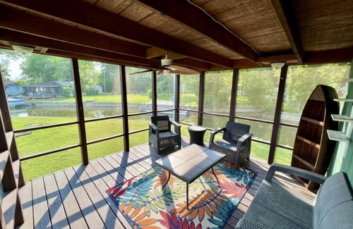 Brimfield House | Idyllic Lake Cottage with Boat Dock and Fire Pit Retreat