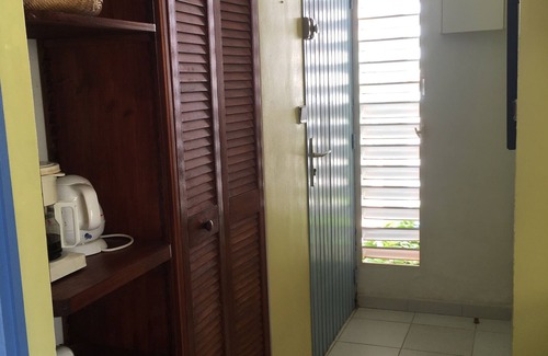 Sainte-Anne Apartment | Stylish 2 Bedroom Retreat with Pool and Lush Gardens