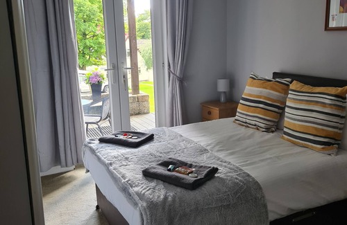 Saint Ann's Chapel Cabin | Family-Friendly 3 Bedroom Lodge with Hot Tub & Pools