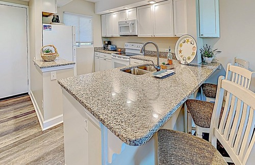 North Litchfield Beach Condo | Inviting 327 Litchfield Retreat - Steps from the Beach