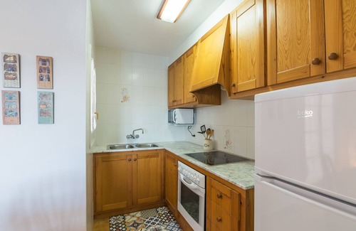 Arenal d'en Castell Apartment | Oceanfront Apartment with Pool, Terrace & Top Ratings