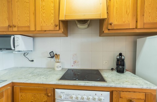 Arenal d'en Castell Apartment | Oceanfront Apartment with Pool, Terrace & Top Ratings