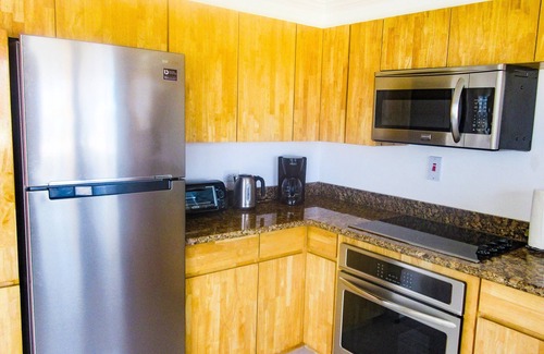 Orange Bay House | Elegant Townhouse with Ocean Views and Private Beach Access