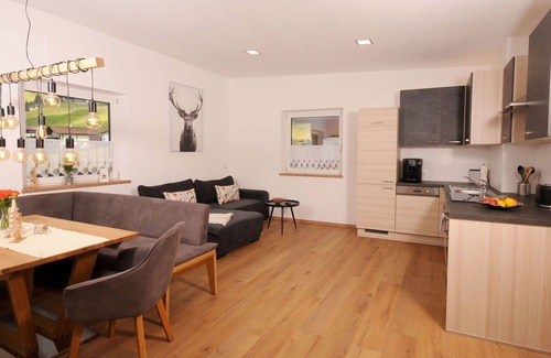 Tux Apartment | Cozy Apartment for 4 with WIFI, Terrace, and Parking