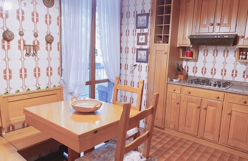 Casbeno Apartment | Prime Apartment Steps from City Center with Lake View