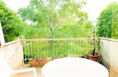 Casbeno Apartment | Prime Apartment Steps from City Center with Lake View