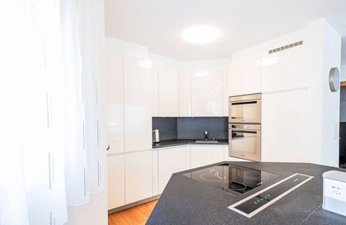 Leukerbad Apartment | Beautiful apartment for 8 people with hot tub, WIFI, TV, balcony, panoramic view and parking