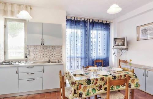Marina di Cecina Apartment | Beautiful apartment for 6 people with WIFI, pool, A/C, TV, patio and pets allowed