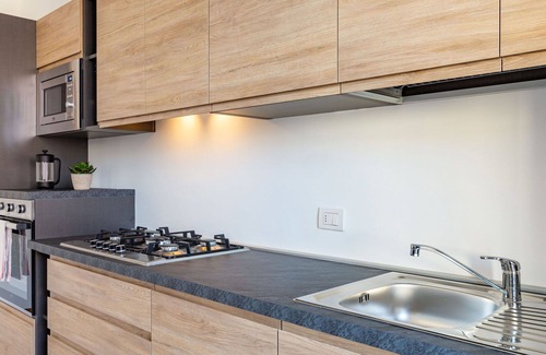 Dervio Apartment | Cozy Apartment for 6 with Balcony and Pet-Friendly Perks