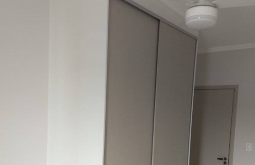 Praia Grande Apartment | Beautiful apartment in front of the sea, walk in the sand ....