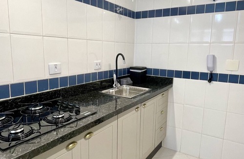 Tombo Apartment | Elegant Apartment in Praia do Tombo with Ocean View & Pool