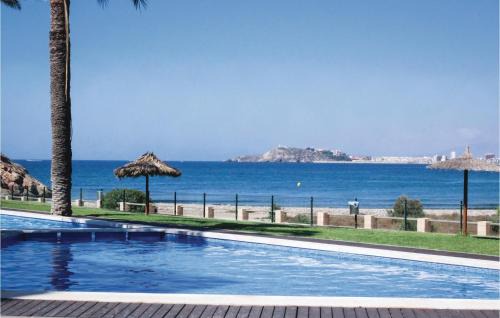 Los Puertos Apartment | Charming 2 Bedroom Apartment with Pool in Isla Plana