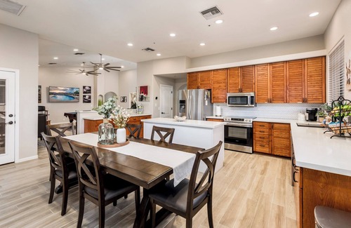 Phoenix House | Inviting Backyard Oasis with Heated Pool & Ocean Views