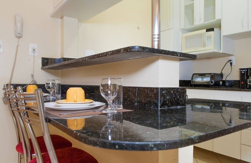 Sudoeste e Octogonal Apartment | Cozy 53m2 Suite with Garage, Pool & Spa Amenities