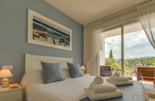 Castillo de Sabinillas Apartment | Serene Buganvillas Garden Property with Oceanfront Views