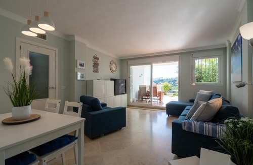 Castillo de Sabinillas Apartment | Serene Buganvillas Garden Property with Oceanfront Views