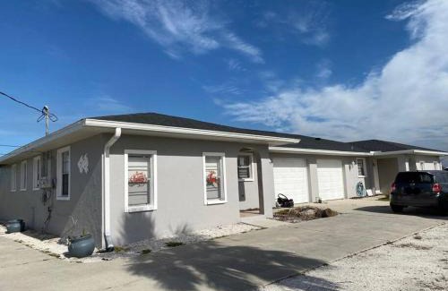 Pebble Beach House | Scenic Canal & Gulf Waterfront Home with Family-Friendly Perks