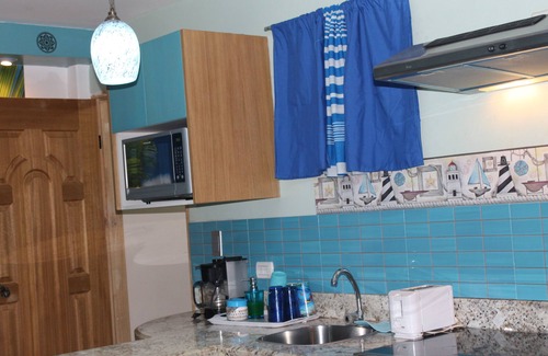 San Pedro Apartment | Cozy Caribbean Apartment for 4 with Spa & Breakfast