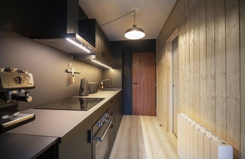 Greolieres les Neiges Condo | Cozy Chalet Apartment with Hot Tub and Wood-Burning Stove