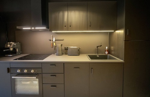 Greolieres les Neiges Condo | Cozy Chalet Apartment with Hot Tub and Wood-Burning Stove