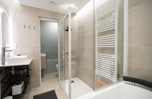 Greolieres les Neiges Condo | Cozy Chalet Apartment with Hot Tub and Wood-Burning Stove
