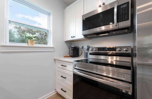 Neptune Beach Apartment | Discover Summer by the Sea: Pet-Friendly Family Retreat
