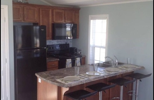 Fernwood House | Enchanting Cottage with Ocean View and Spa Amenities
