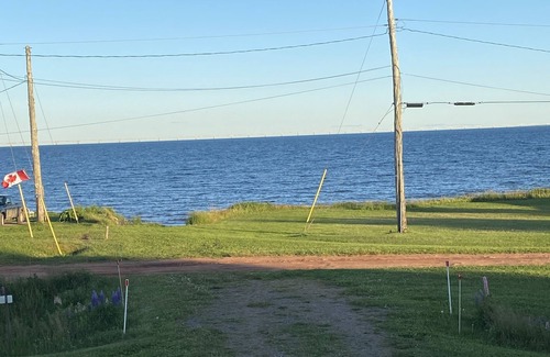 Fernwood House | Enchanting Cottage with Ocean View and Spa Amenities