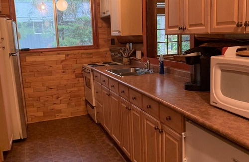 Victoria Beach Cottage | Cozy Log Cabin Retreat with Family-Friendly Amenities