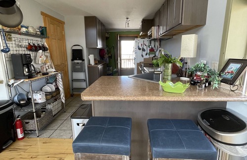 Elk Meadows Cabin | Scenic Log Cabin Retreat: Ocean Views & Spa Amenities
