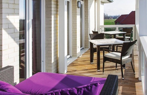 Wremen Apartment | Serene Apartment with Sauna & Balcony at Resort Deichgraf