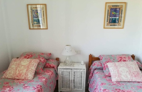 Islantilla Apartment | Charming Duplex with Pool, 5 Minutes to the Beach