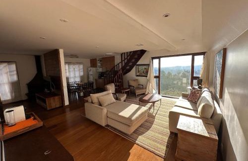 Alto do Capivari Hotel | Discover Lindo Duplex: Poolside Retreat in Campos do Jordão