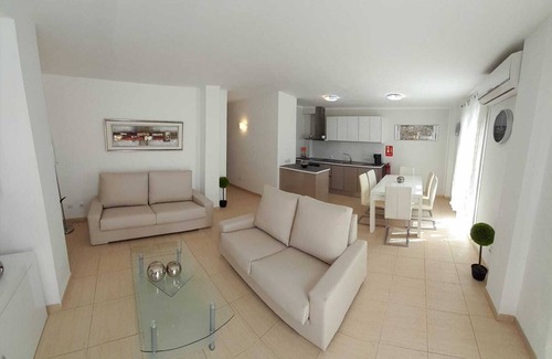 Cala Mandia Apartment | Cozy Duplex Steps from Cala Anguila Beaches with Ocean View