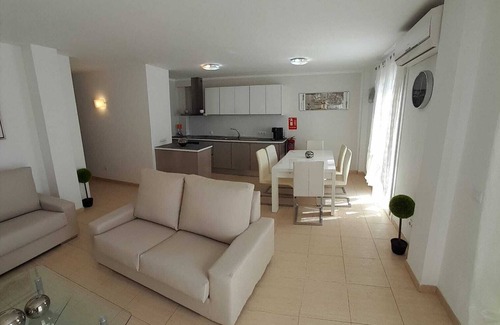 Cala Mandia Apartment | Cozy Duplex Steps from Cala Anguila Beaches with Ocean View