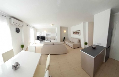 Cala Mandia Apartment | Cozy Duplex Steps from Cala Anguila Beaches with Ocean View