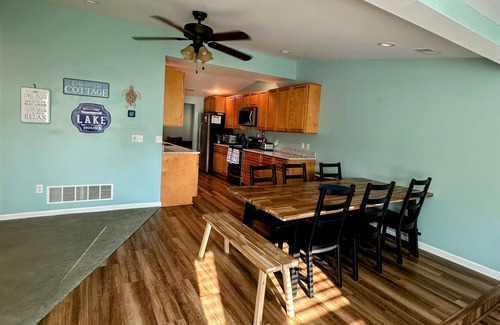 Sand Creek House | Inviting Evans Lakefront Getaway with Private Beach Access