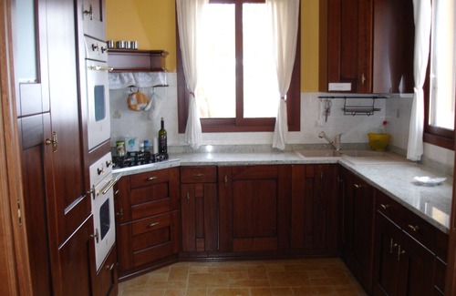 Regione Ronchi Apartment | Serene Retreat with Private Garden & Oceanfront Pool