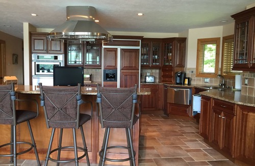 Empire House | Idyllic Glen Lake Vacation Home with Spa & Lake View