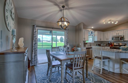 The Villages House | Inviting Golf Front Retreat with Pool and Ocean Views