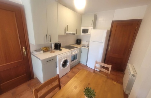 Mogro Apartment | Ground Floor Retreat with Garden and Family Amenities