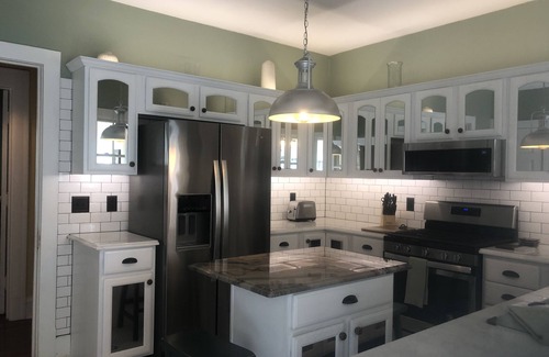 Davenport House | Historic Carriage House Retreat in Exclusive McClellan Heights