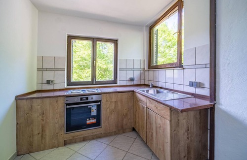 Netretic House | Serene Retreat by the Dobra River with Spa and Lake Views