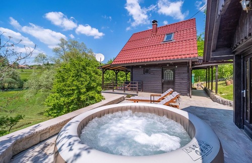 Netretic House | Serene Retreat by the Dobra River with Spa and Lake Views