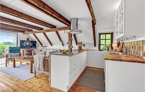 Hjarbæk House | Cozy Home in Løgstrup with Kitchen and Family-Friendly Amenities