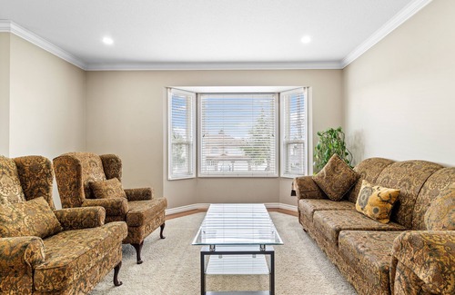 Langley House | Inviting Langley Home with Expansive Patio for Families