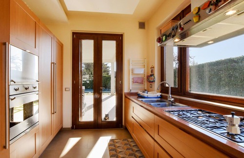 Modica House | Elegant Villa with Pool and Daylit Interiors for Your Escape