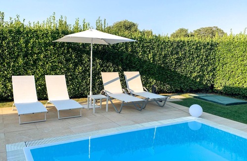 Modica House | Elegant Villa with Pool and Daylit Interiors for Your Escape